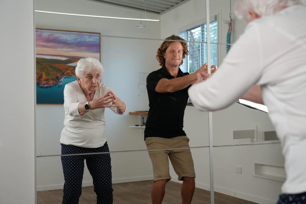 corrective-exercise-bonny-hills-laurieton-lake-cathie-seniors-hip-squat-shoulder-chair-pose-stretch-activation-strength